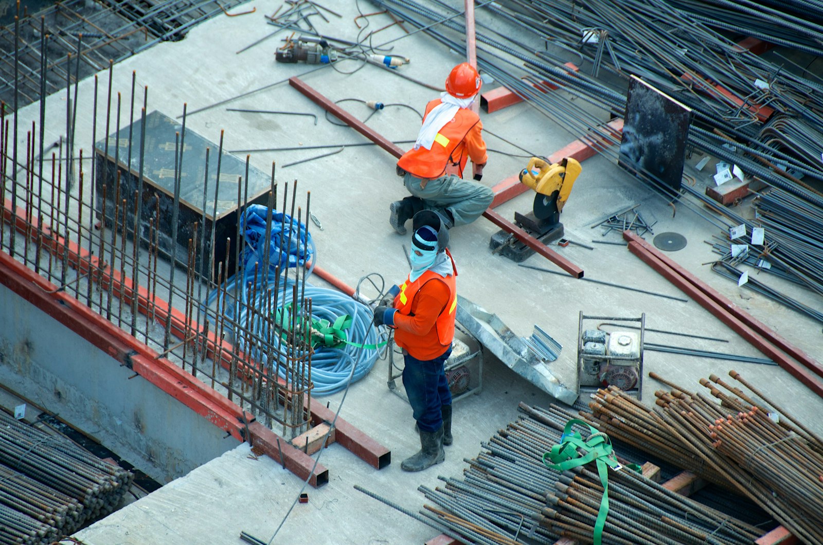 Batch Construction crew fixing reinforcement on site